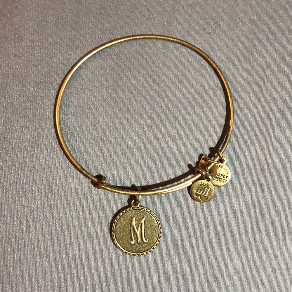 Gold Alex & Ani bracelet w/ “M” monogram pendant